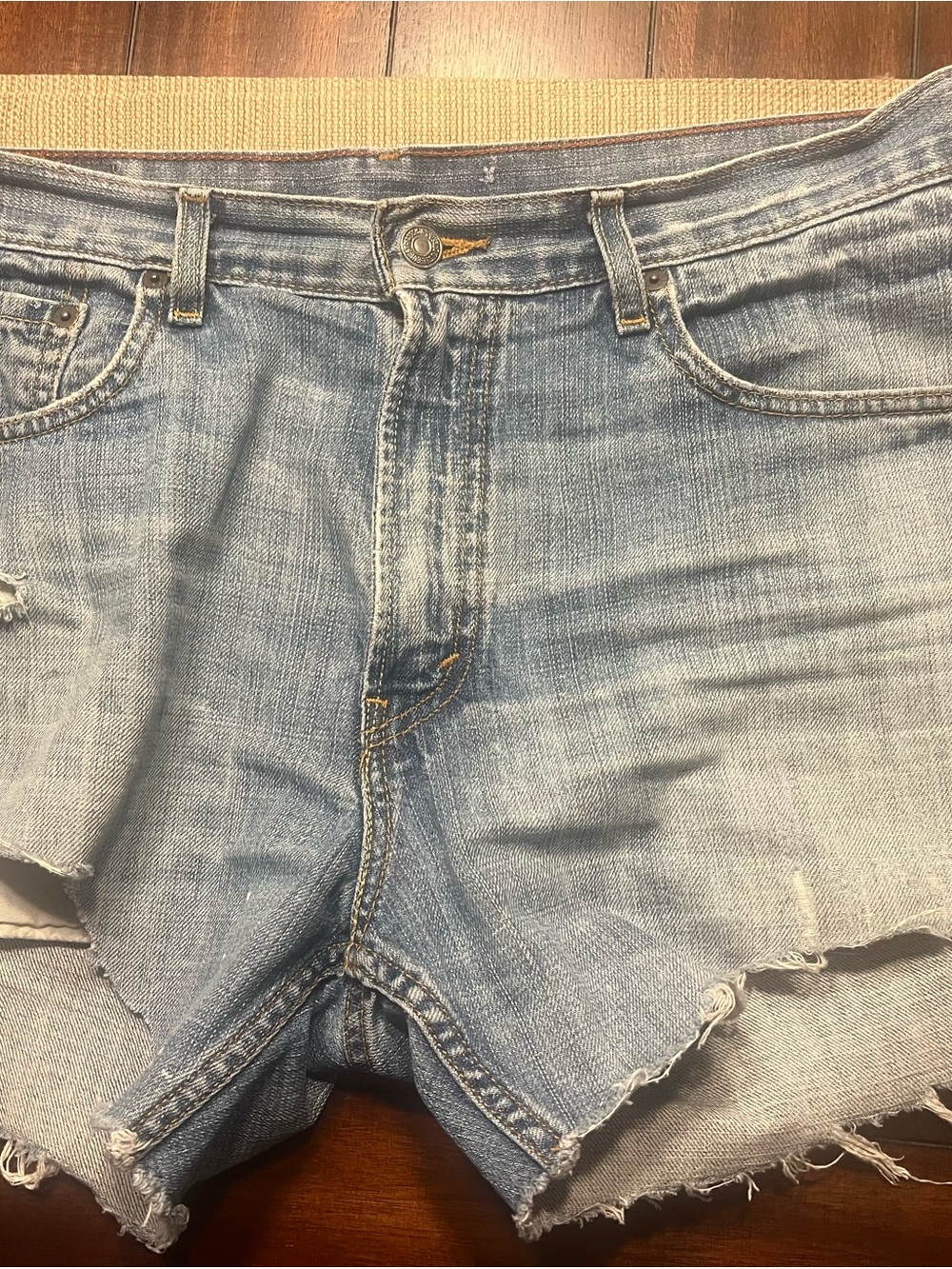 Classic Levi’s cut off shorts naturally worn and distressed. 559 style